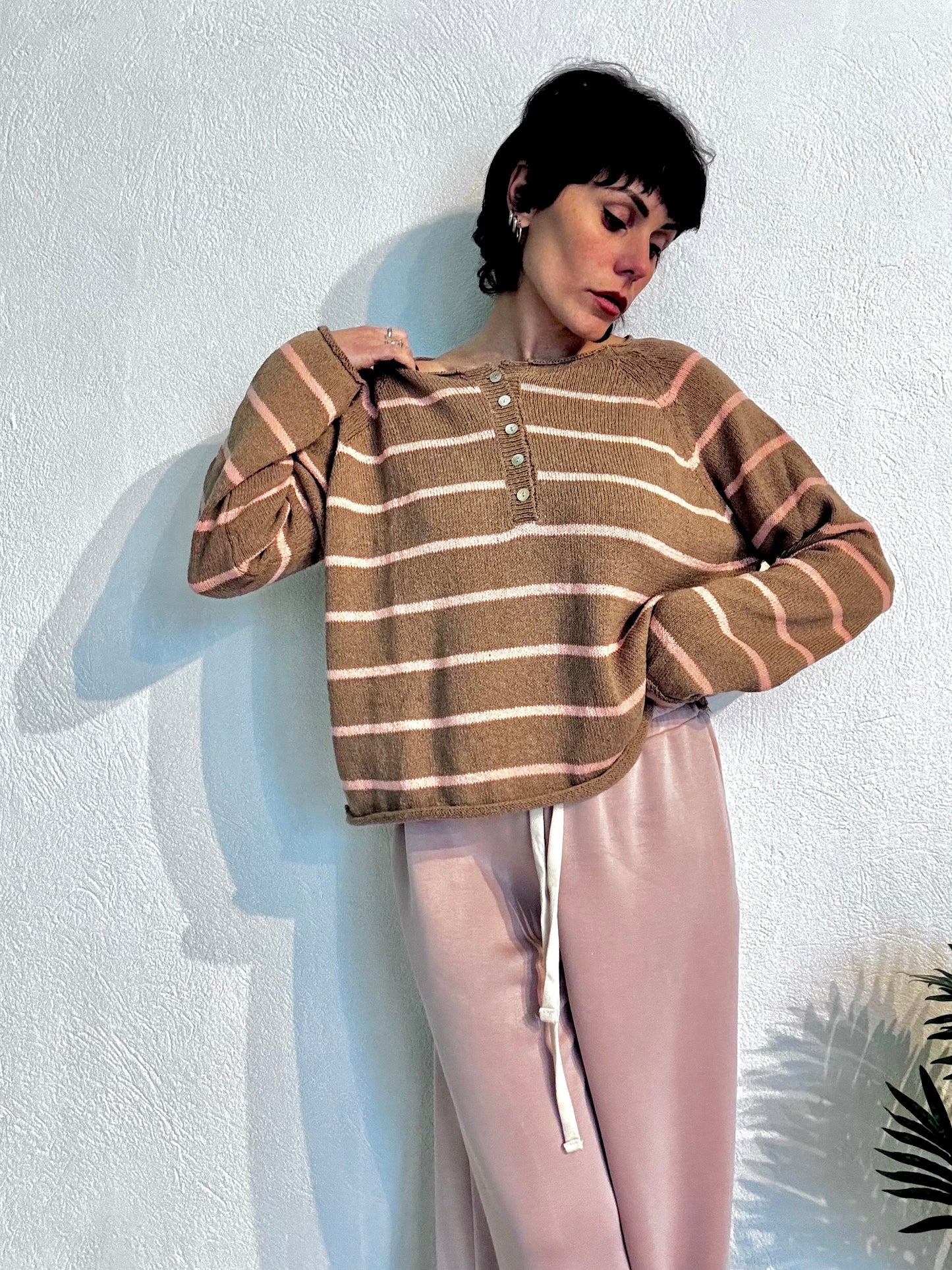 Maglia a righe con bottoni